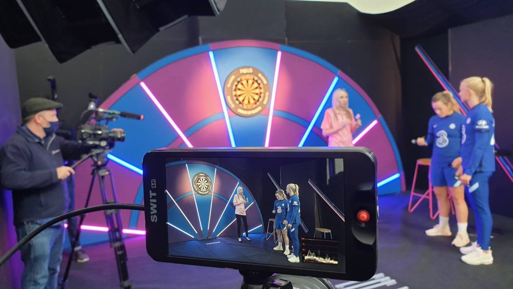 Filming the darts studio set with two Chelsea women players and a darts player