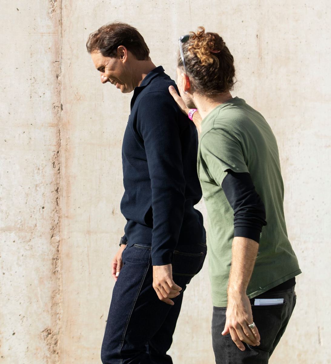 Hagai Lazar and Rafael Nadal walking between setups
